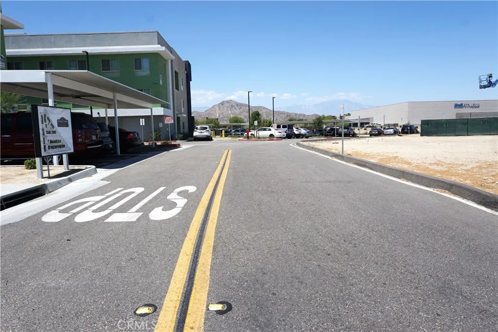 0 Southwest Jefferson Indio, CA 92201 - Photo 9 of 12 a view of a street with a building in the background