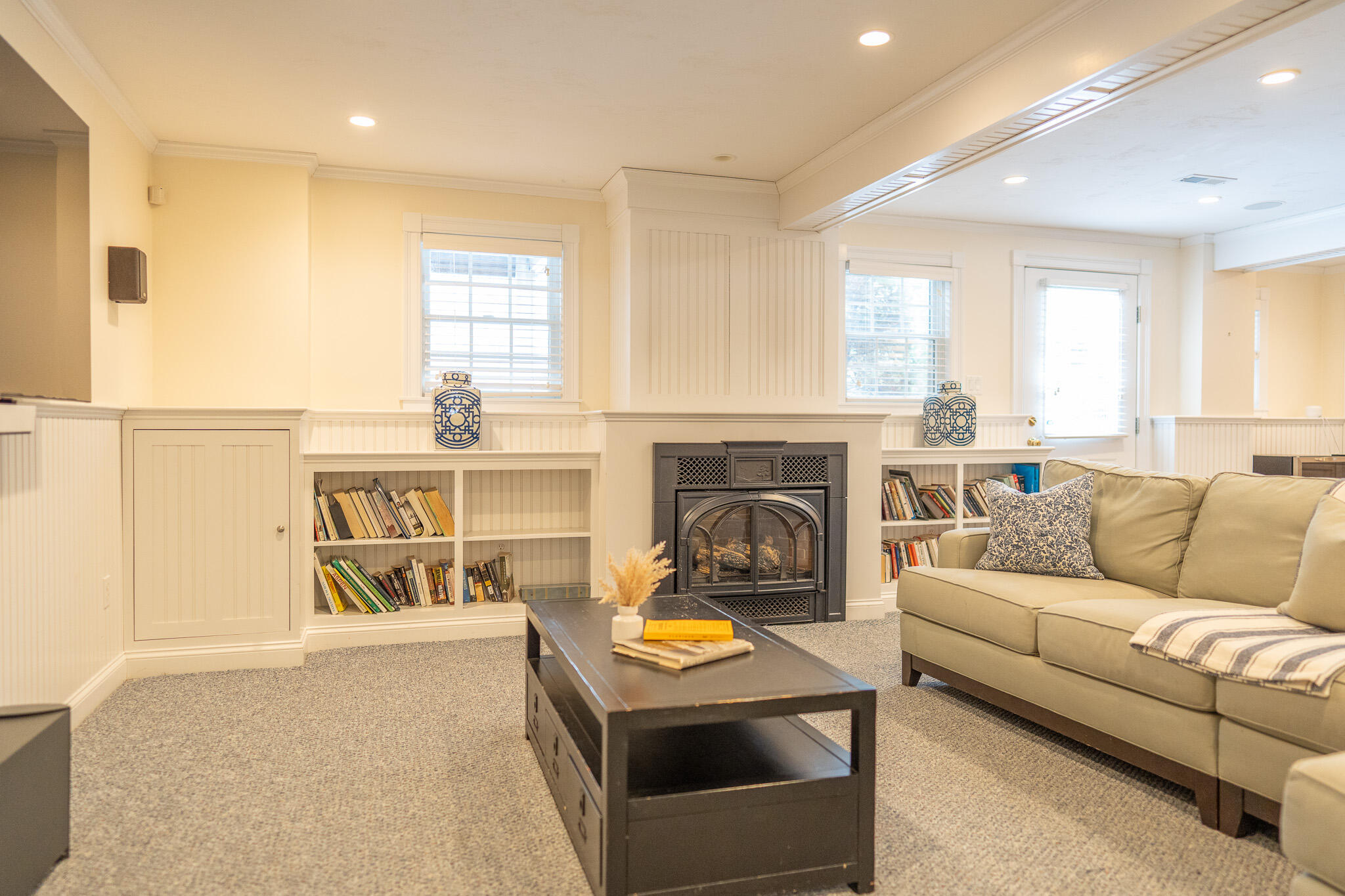 10 Abbey Gate Road Cotuit, MA 02635 - Photo 57 of 67 a living room with furniture and a fireplace