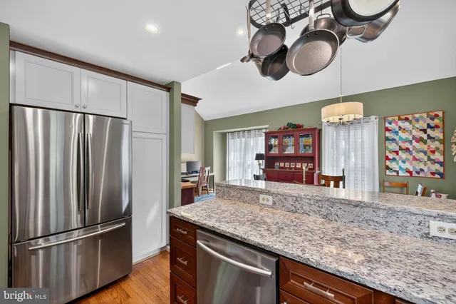 a view of room with stairs and a couch
