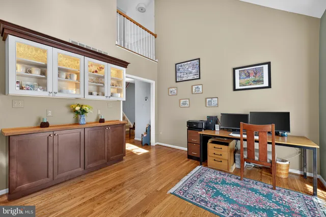 a view of a house with a yard and garage
