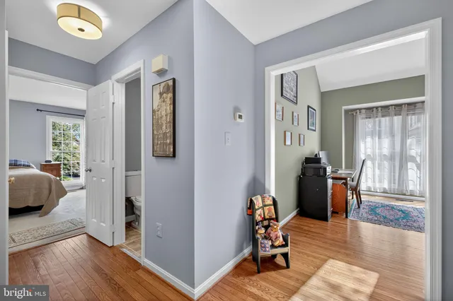 a view of a house with a yard porch and sitting area