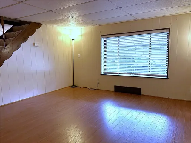 a bathroom with a sink mirror vanity and toilet