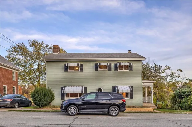 a kitchen with stainless steel appliances granite countertop a stove and a sink