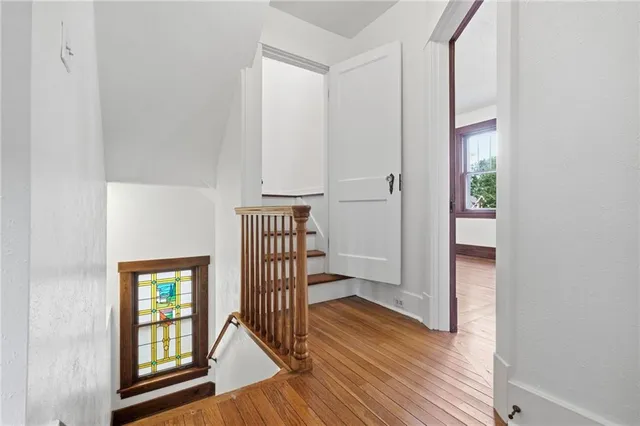 a view of an entryway with wooden floor