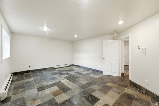 3535 Homestead Road Park City, UT 84098 - Photo 55 of 81 Spacious room featuring multi-tone slate tile flooring, white painted walls, and recessed ceiling lighting