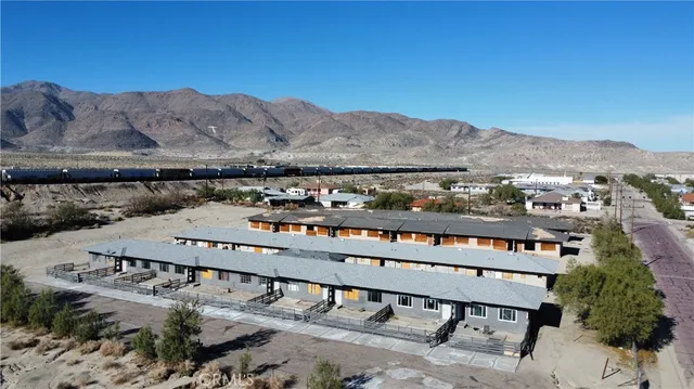 a view of a chairs and table on the terrace