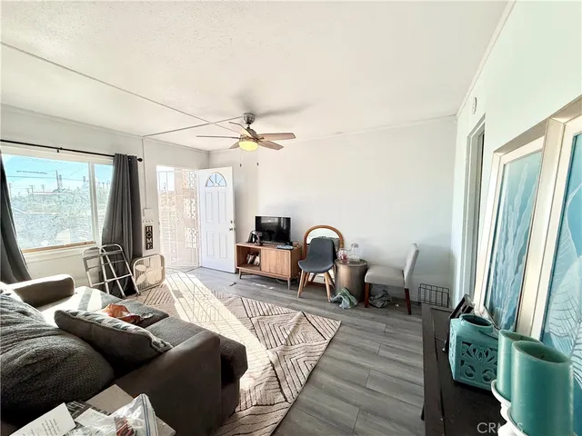 a living room with a couch and a flat screen tv