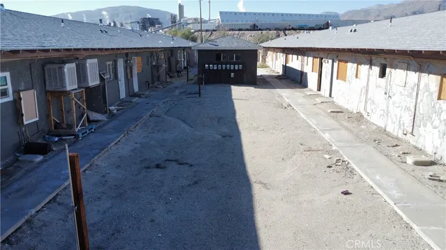 a view of a balcony with car parked