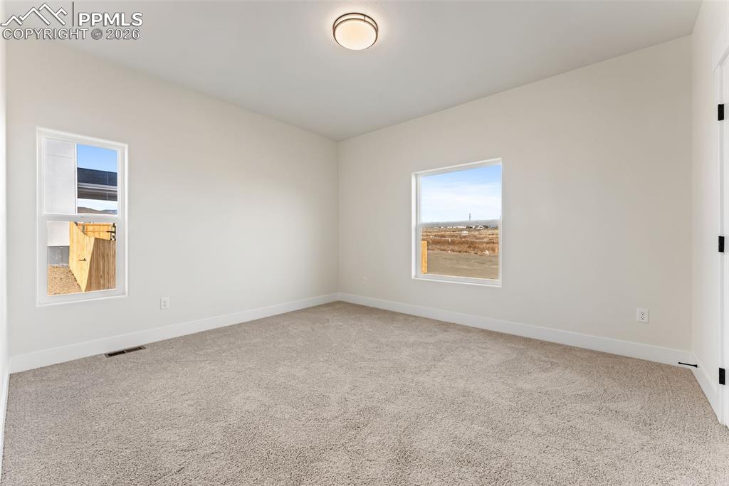 806 Keystone Loop Canon City, CO 81212 - Photo 27 of 39 an empty room with a window