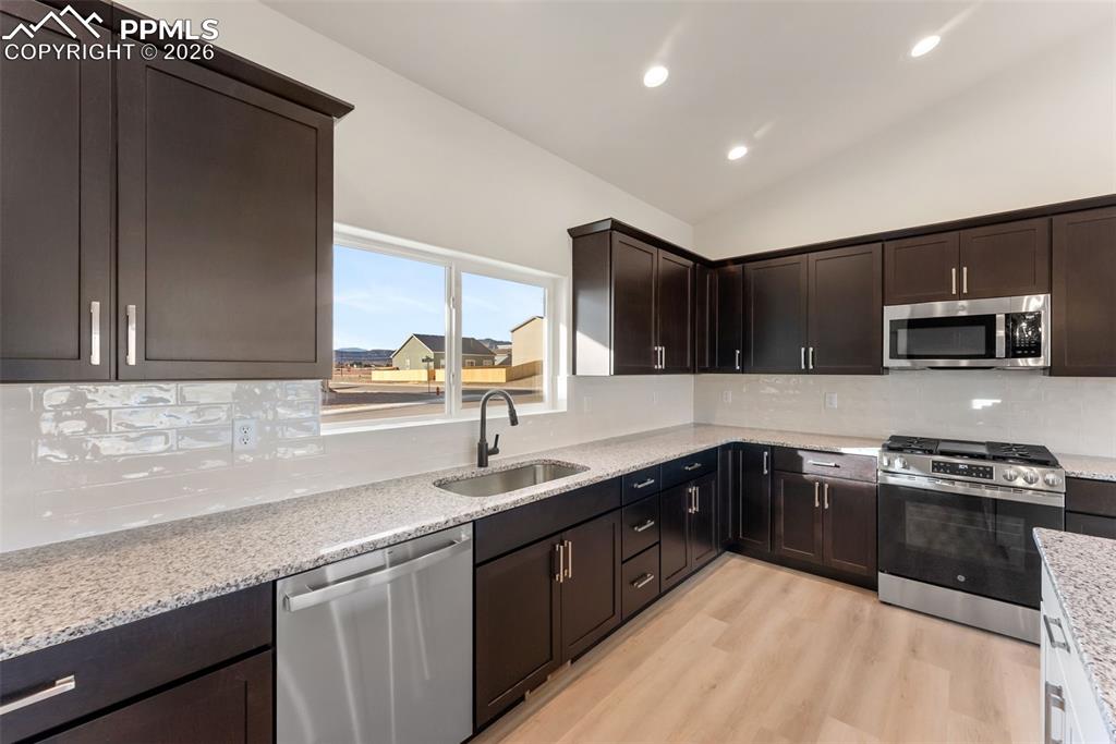 806 Keystone Loop Canon City, CO 81212 - Photo 6 of 39 a kitchen with stainless steel appliances granite countertop a sink stove and microwave