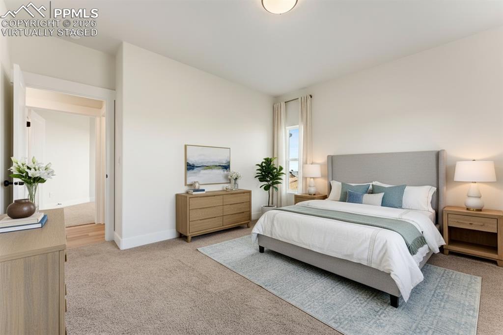 806 Keystone Loop Canon City, CO 81212 - Photo 10 of 39 a bedroom with bed and window