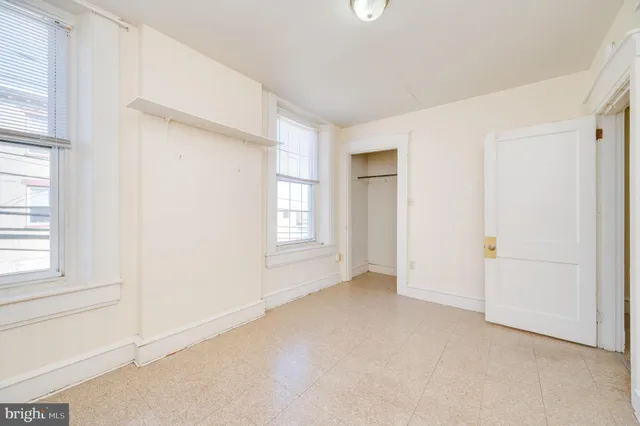 a view of an empty room and window