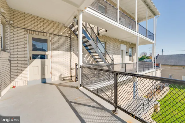 a view of a brick wall of the building