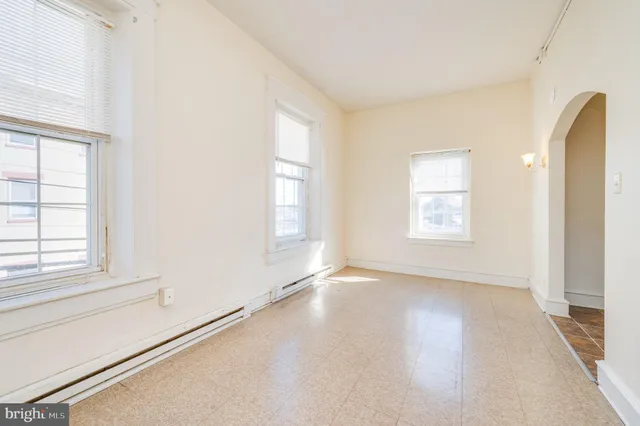 an empty room with windows