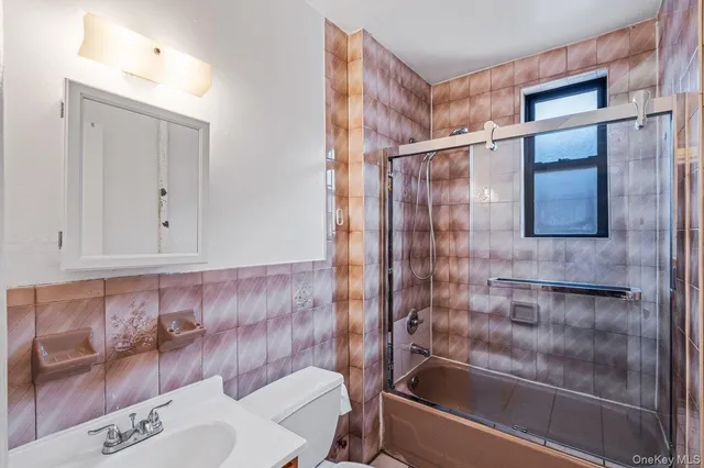 a bathroom with a sink and a bathtub