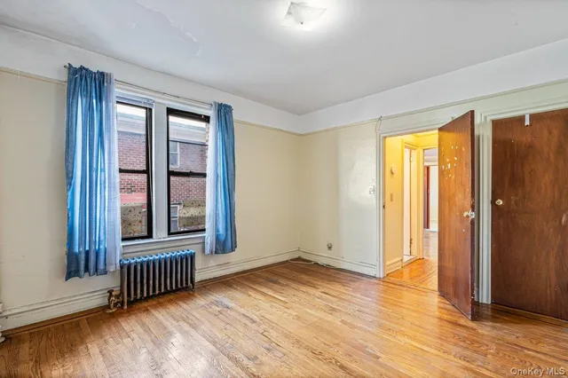 wooden floor and windows in an empty room