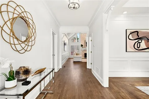 a view of entryway with wooden floor