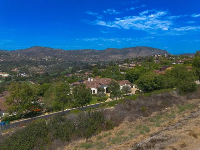 a view of a golf course with a lake