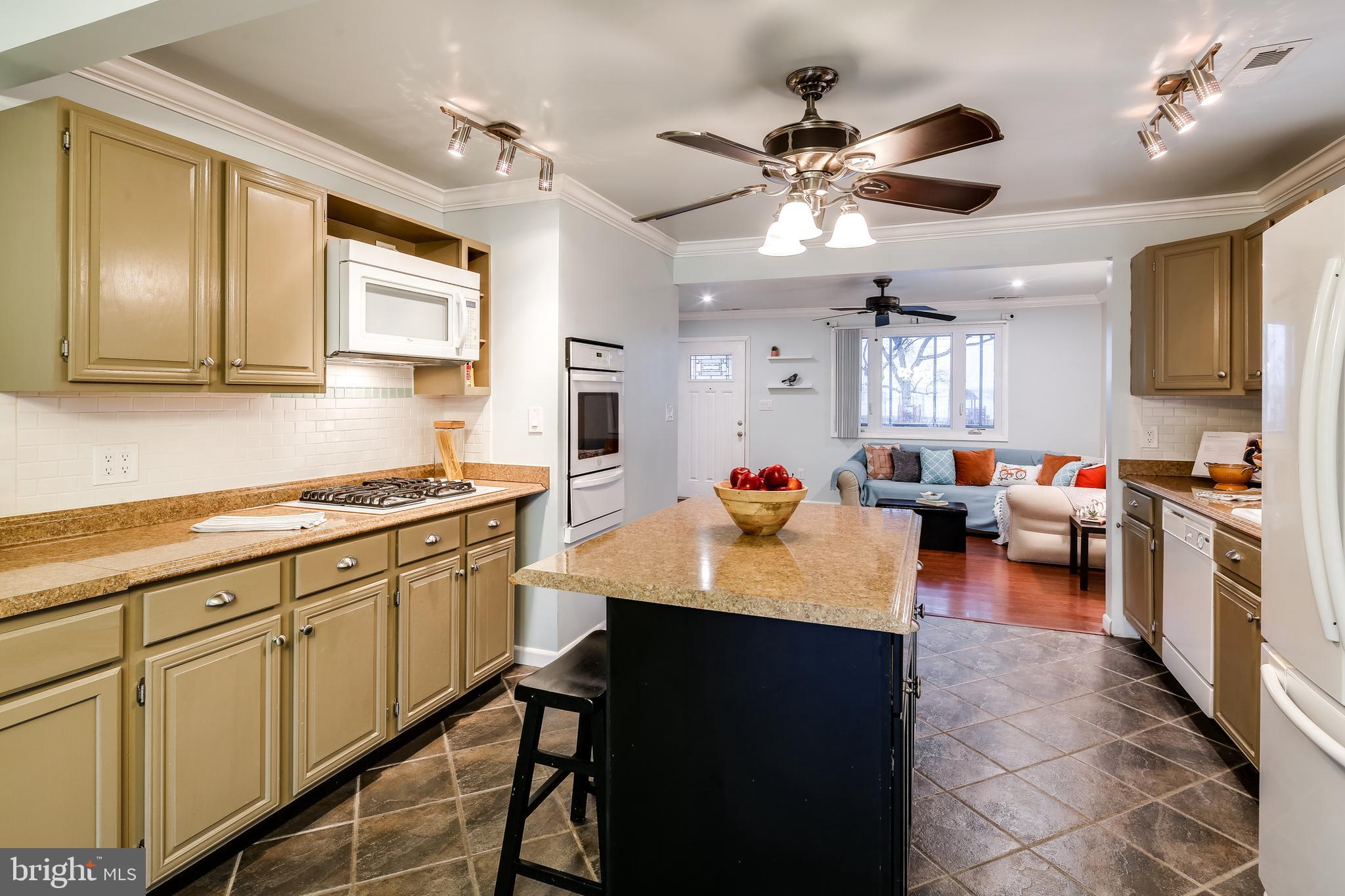 8255 Bullneck Road Baltimore, MD 21222 - Photo 2 of 29 Adequate lighting as you prepare your meals.