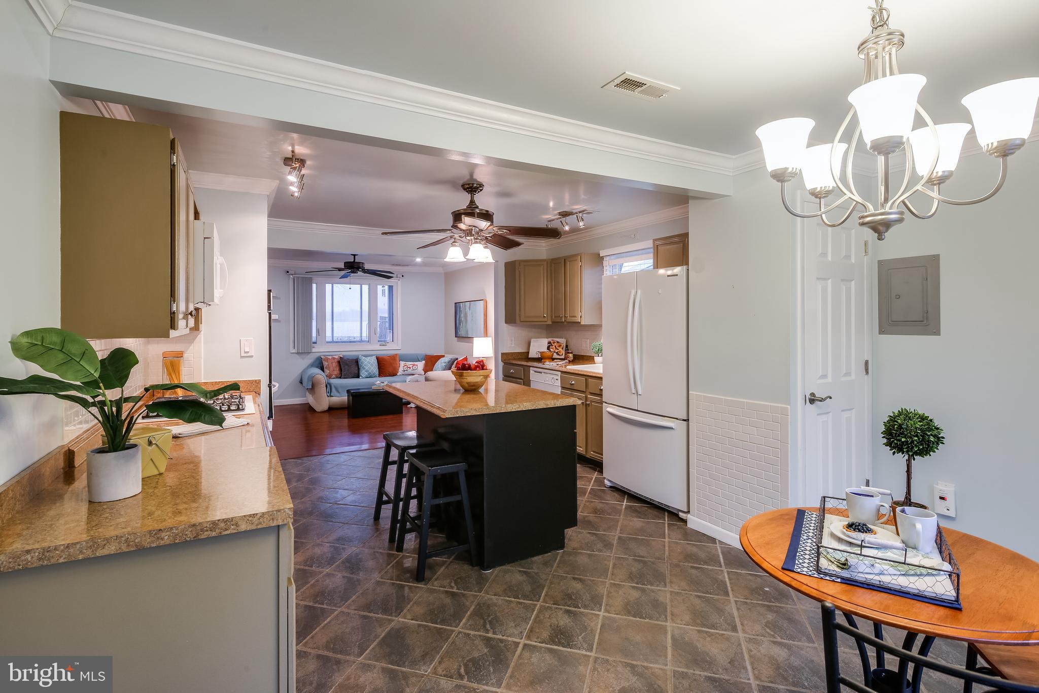8255 Bullneck Road Baltimore, MD 21222 - Photo 11 of 29 Kitchen and Dining Area has seamless flow.