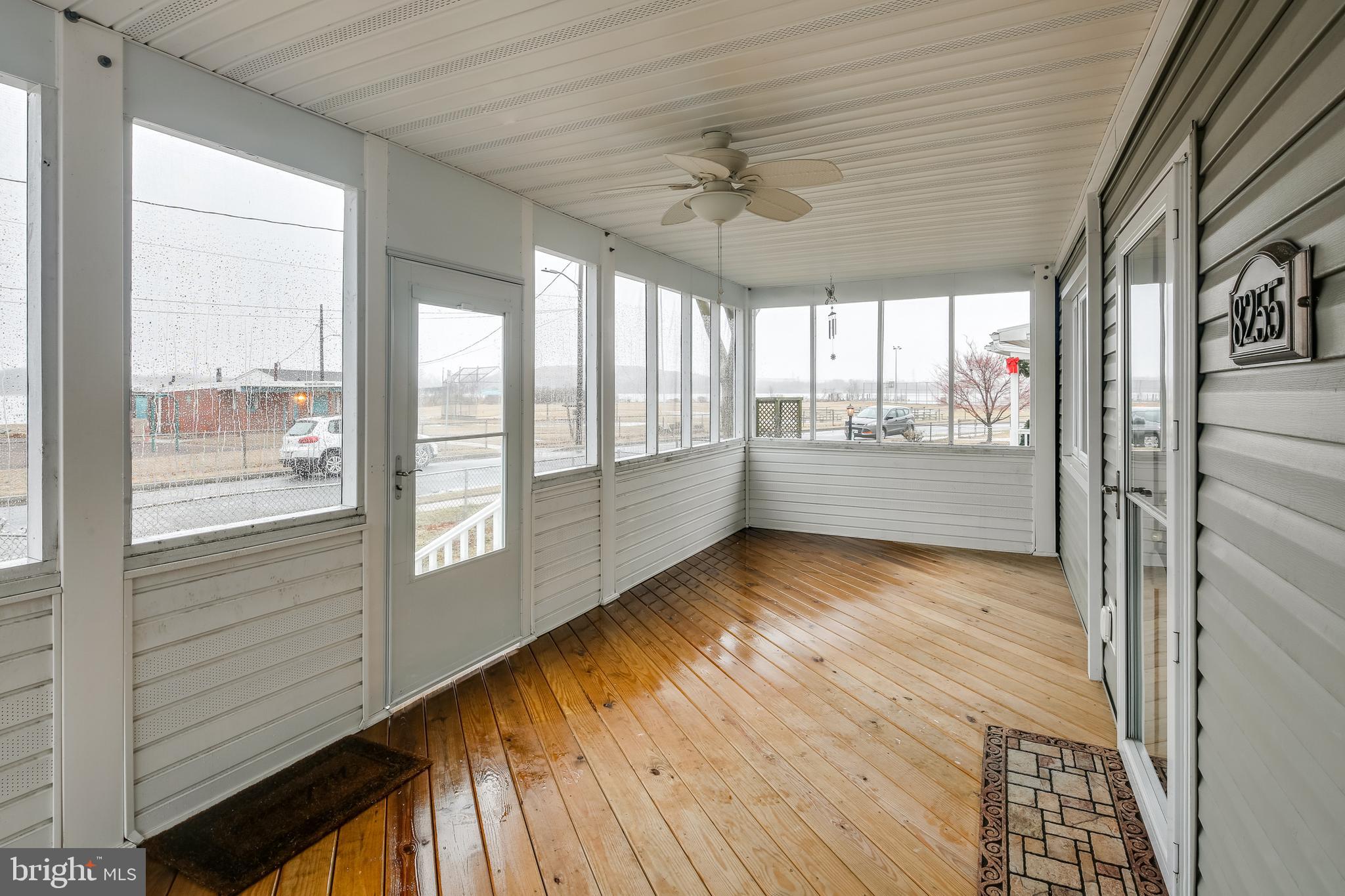 8255 Bullneck Road Baltimore, MD 21222 - Photo 22 of 29 Screened in Front Porch facing Bullneck Creek.