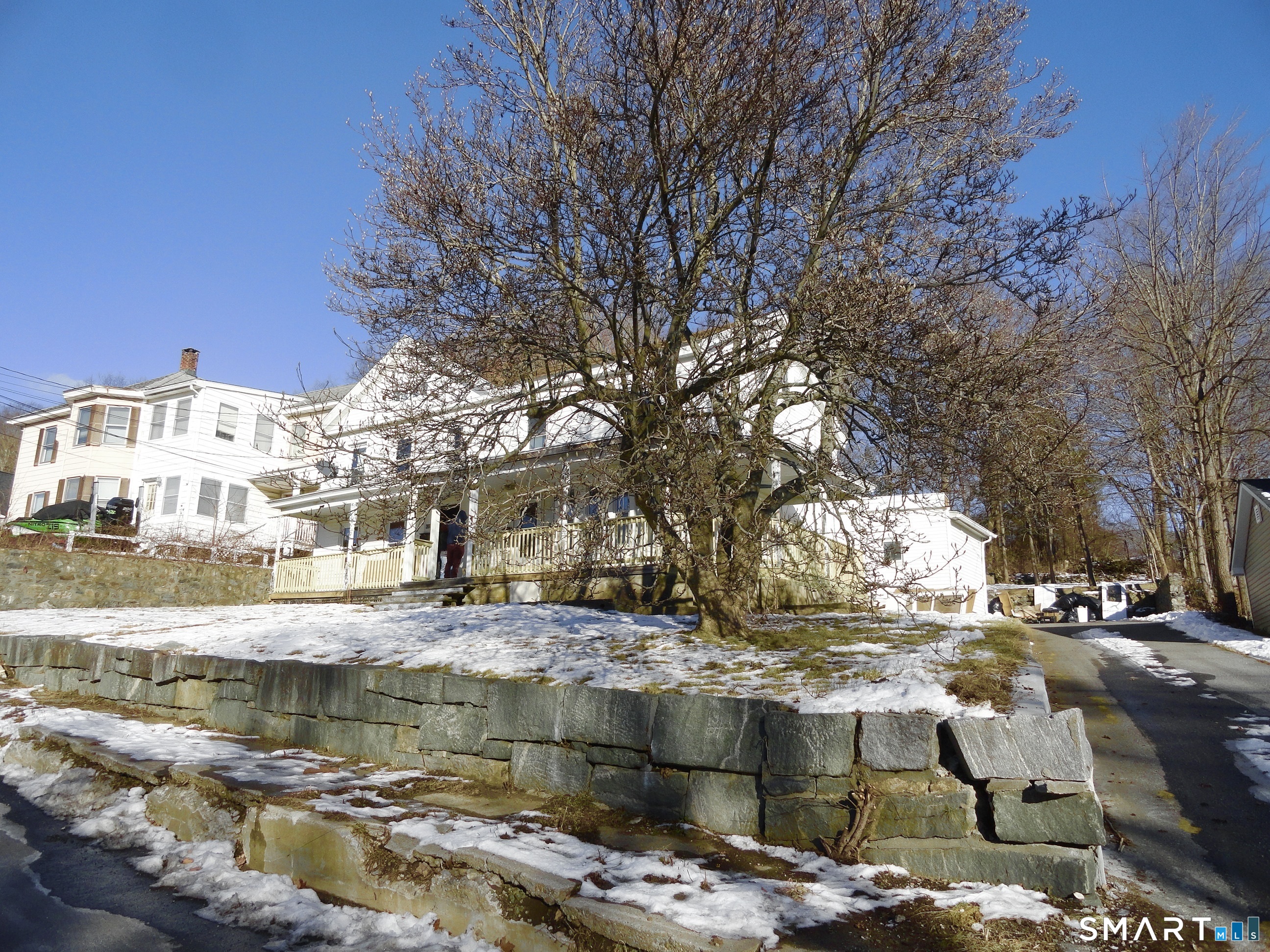 830 Main Street Winsted, CT 06098 - Photo 1 of 17 a view of yard with tree in front of it
