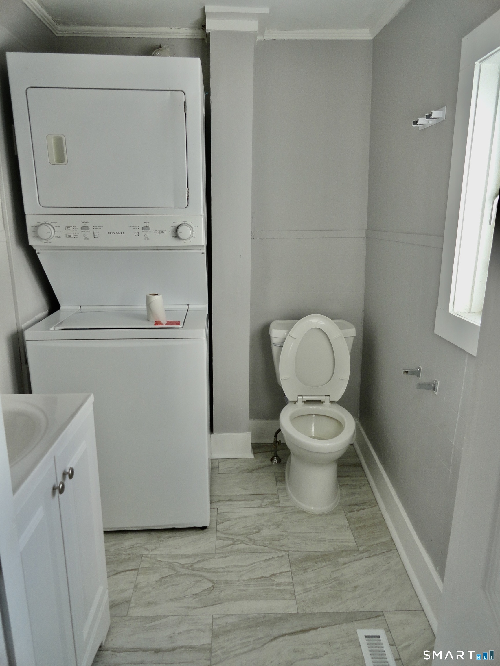830 Main Street Winsted, CT 06098 - Photo 15 of 17 a bathroom with a toilet and a sink