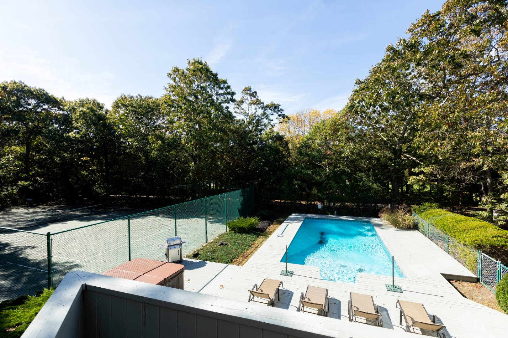 15 North Quarter Road Westhampton, NY 11977 - Photo 14 of 20 a view of a swimming pool with a patio