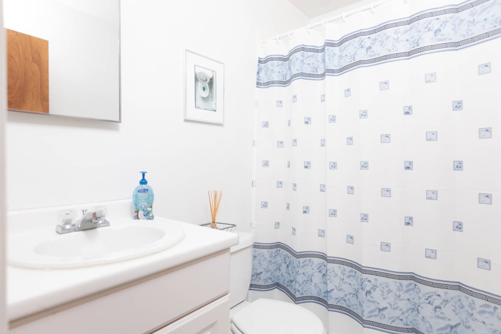 15 North Quarter Road Westhampton, NY 11977 - Photo 18 of 20 a bathroom with a sink toilet and shower