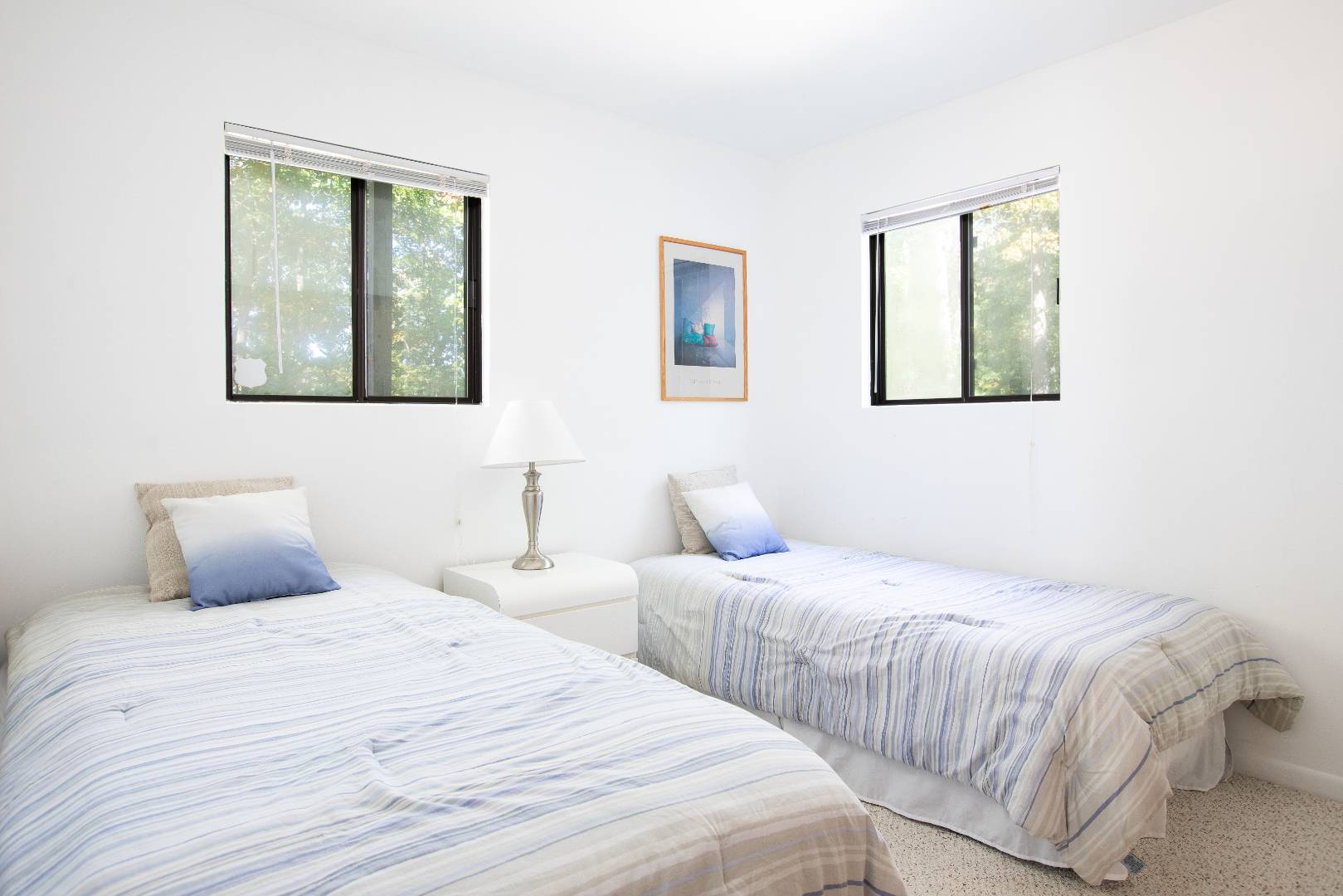 15 North Quarter Road Westhampton, NY 11977 - Photo 19 of 20 a bedroom with two beds and painting on the wall