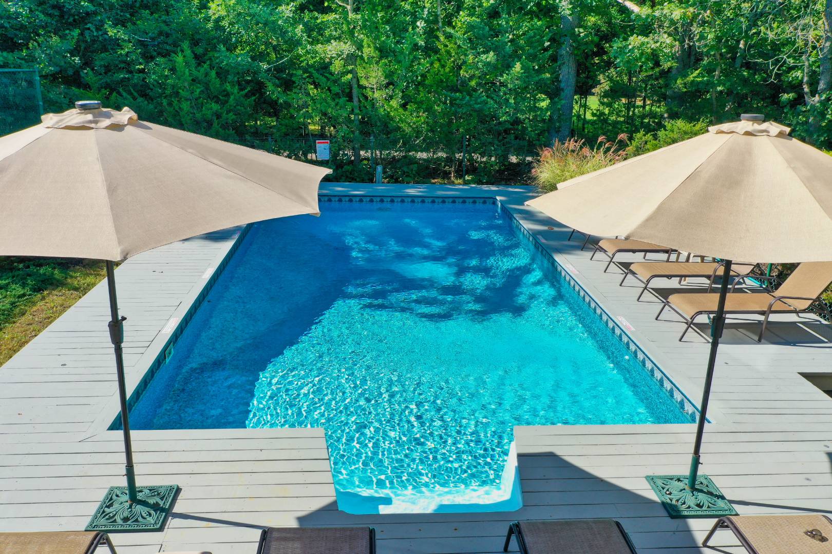 15 North Quarter Road Westhampton, NY 11977 - Photo 20 of 20 a view of a backyard with sitting area