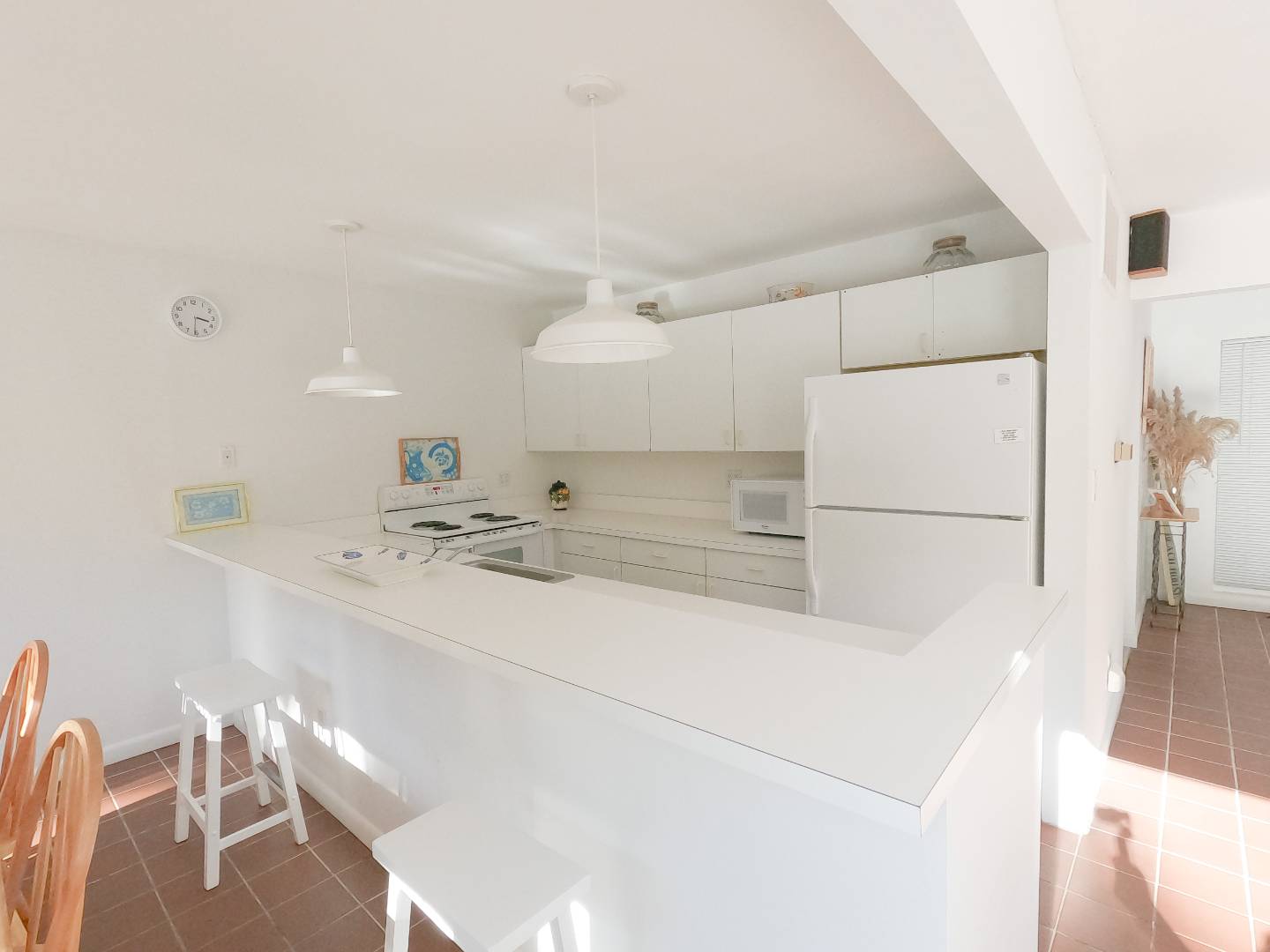 15 North Quarter Road Westhampton, NY 11977 - Photo 5 of 20 a view of a kitchen with a sink stainless steel appliances and cabinets