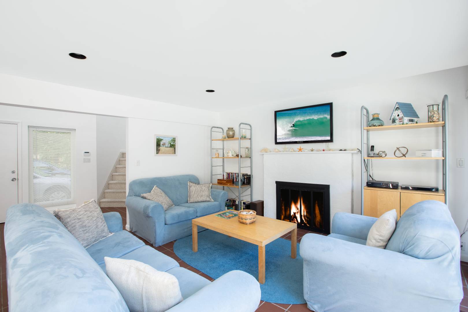 15 North Quarter Road Westhampton, NY 11977 - Photo 8 of 20 a living room with furniture and a fireplace