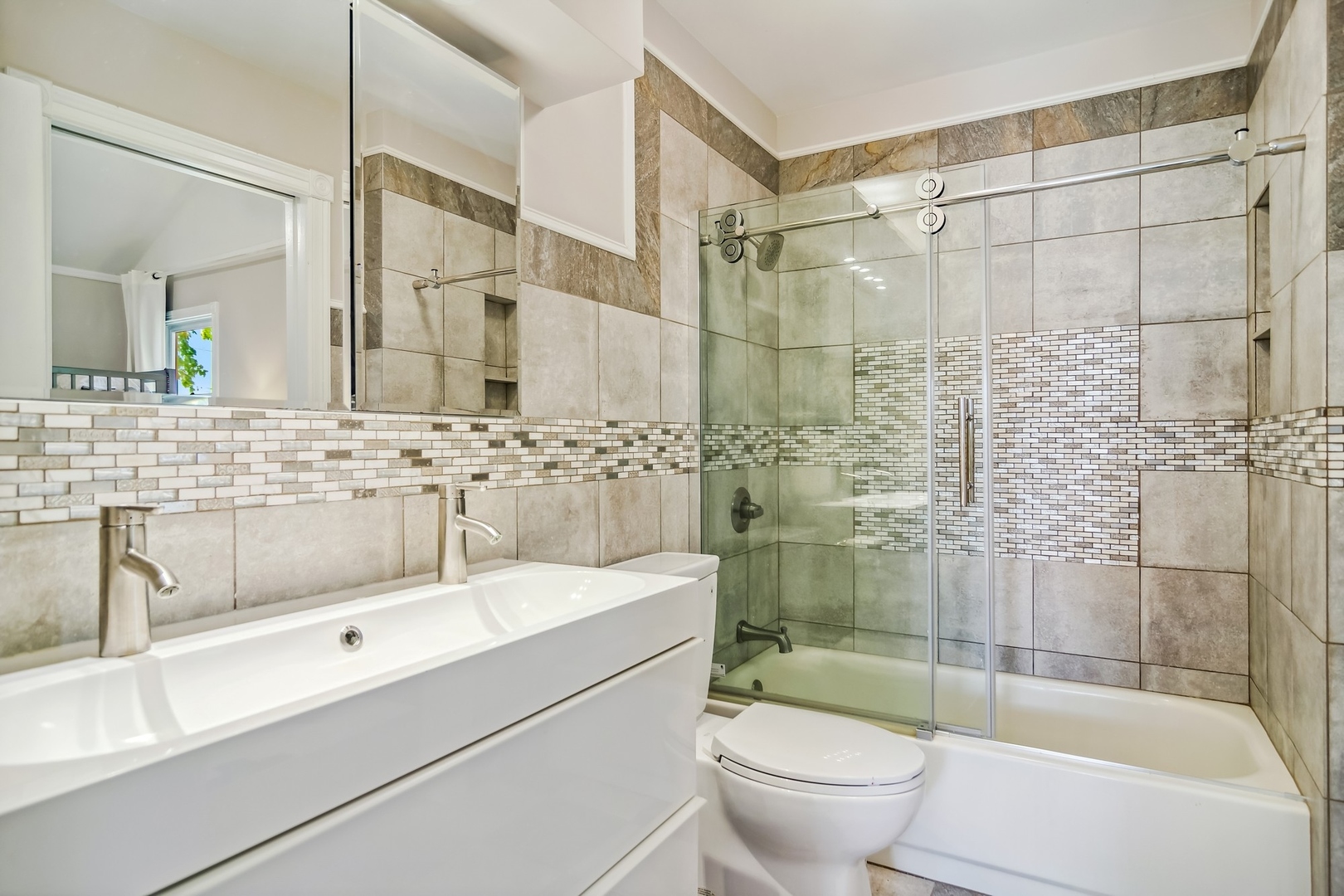 8713 Gardner Road Fox River Grove, IL 60021 - Photo 18 of 25 a bathroom with a sink toilet and shower