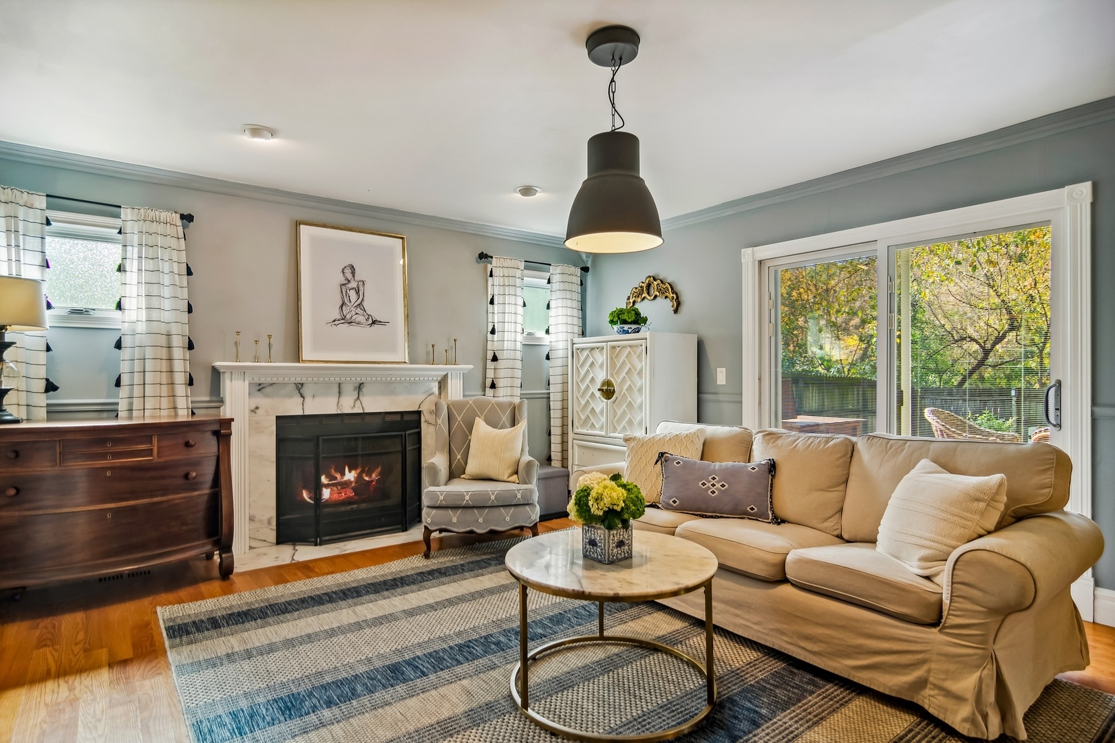 8713 Gardner Road Fox River Grove, IL 60021 - Photo 5 of 25 a living room with furniture and a fireplace
