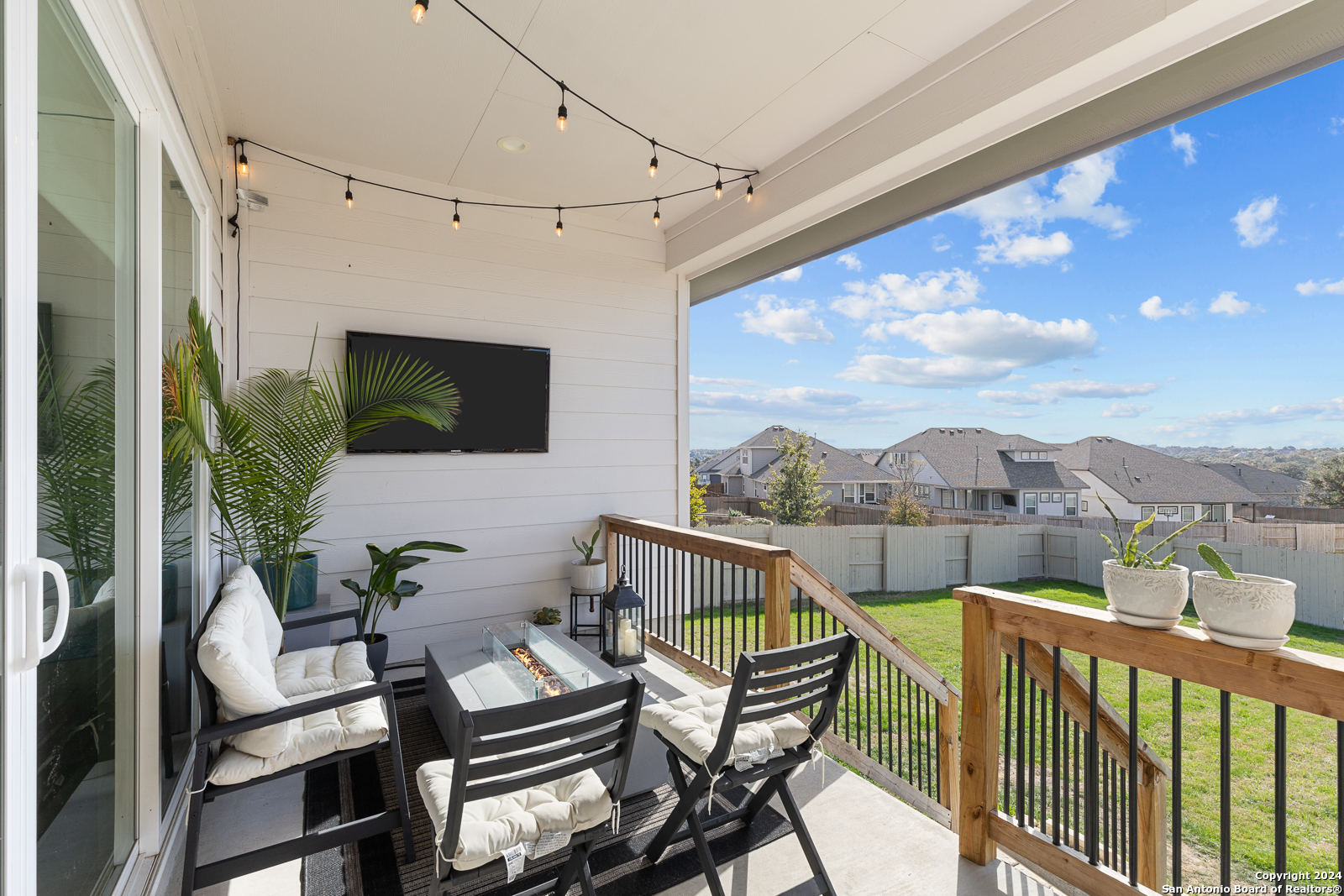 1521 Escarpment Road New Braunfels, TX 78132 - Photo 58 of 65 a view of a balcony with chairs