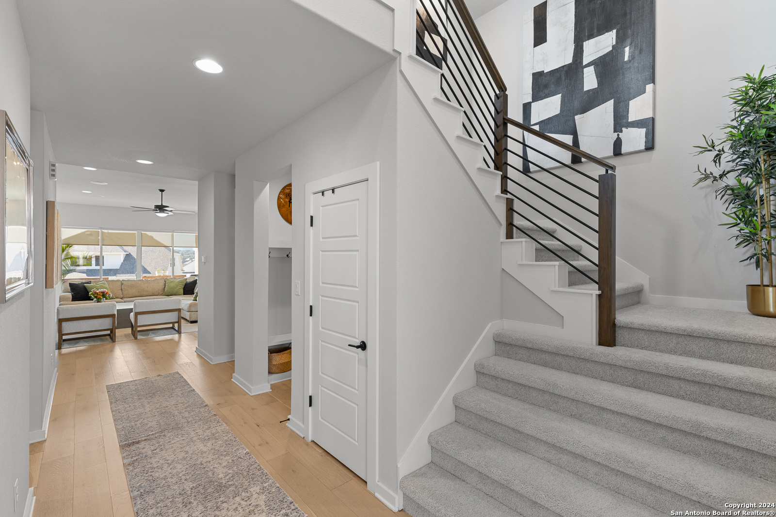 1521 Escarpment Road New Braunfels, TX 78132 - Photo 6 of 65 a view of entryway and hall with wooden floor