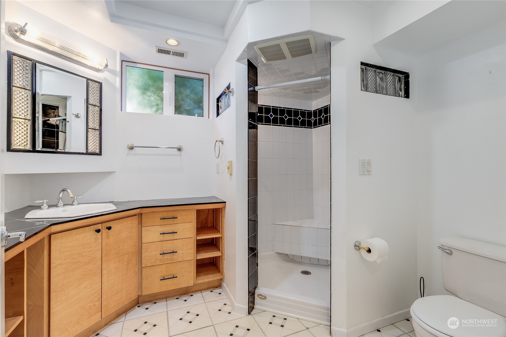 6705 Skipley Road Snohomish, WA 98290 - Photo 30 of 40 a bathroom with a sink toilet and shower