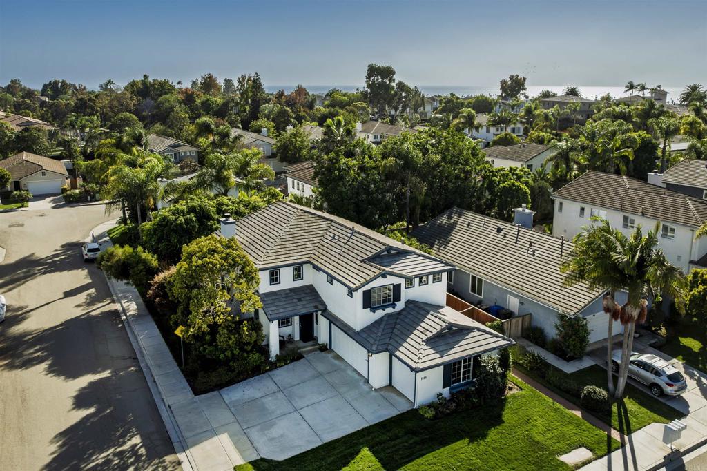 1045 Lighthouse Road Carlsbad, CA 92011 - Photo 1 of 1 an aerial view of a house with garden space and street view