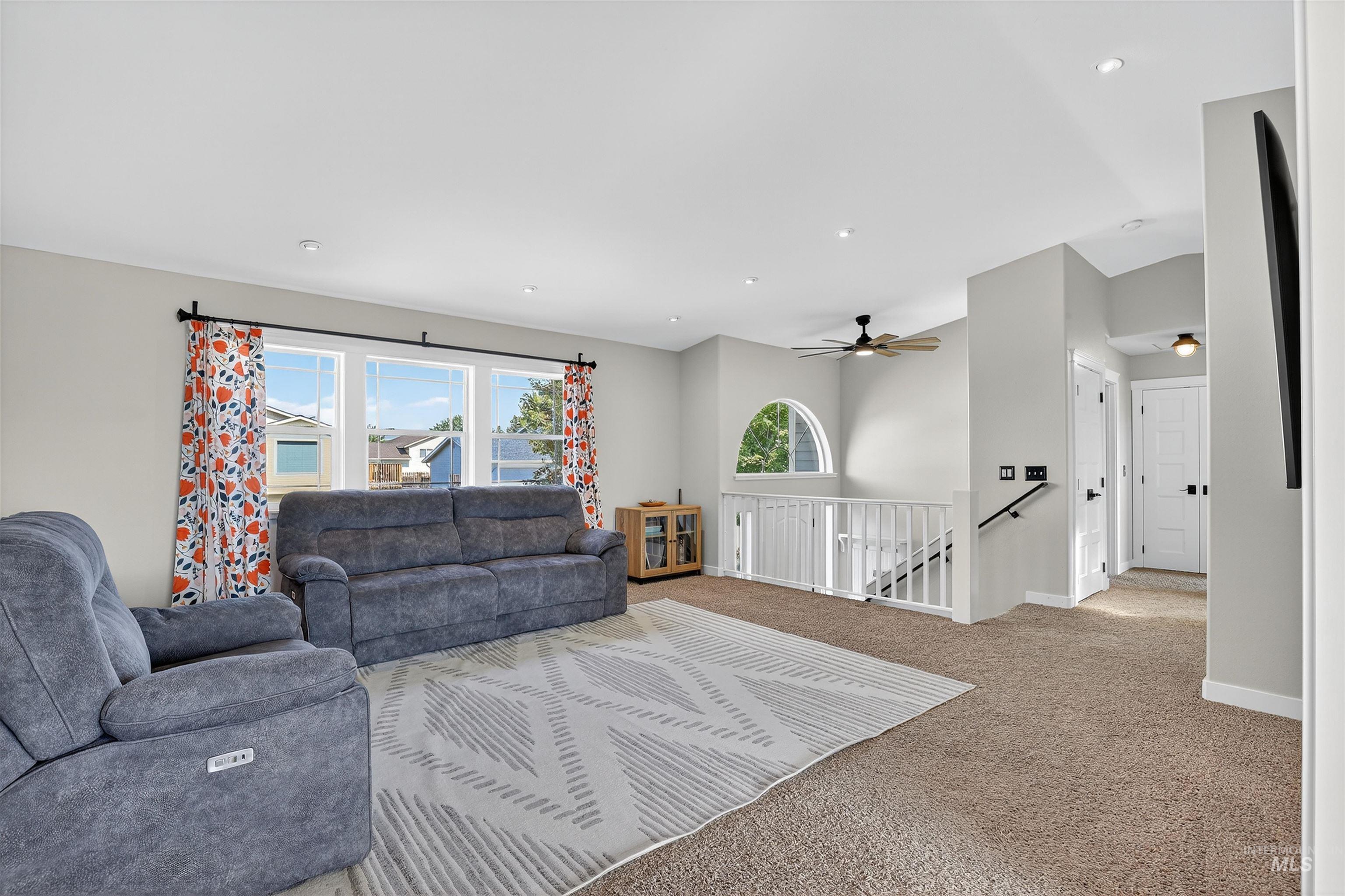1810 Birch Drive Lewiston, ID 83501 - Photo 12 of 47 Living room featuring carpet floors and recessed lighting