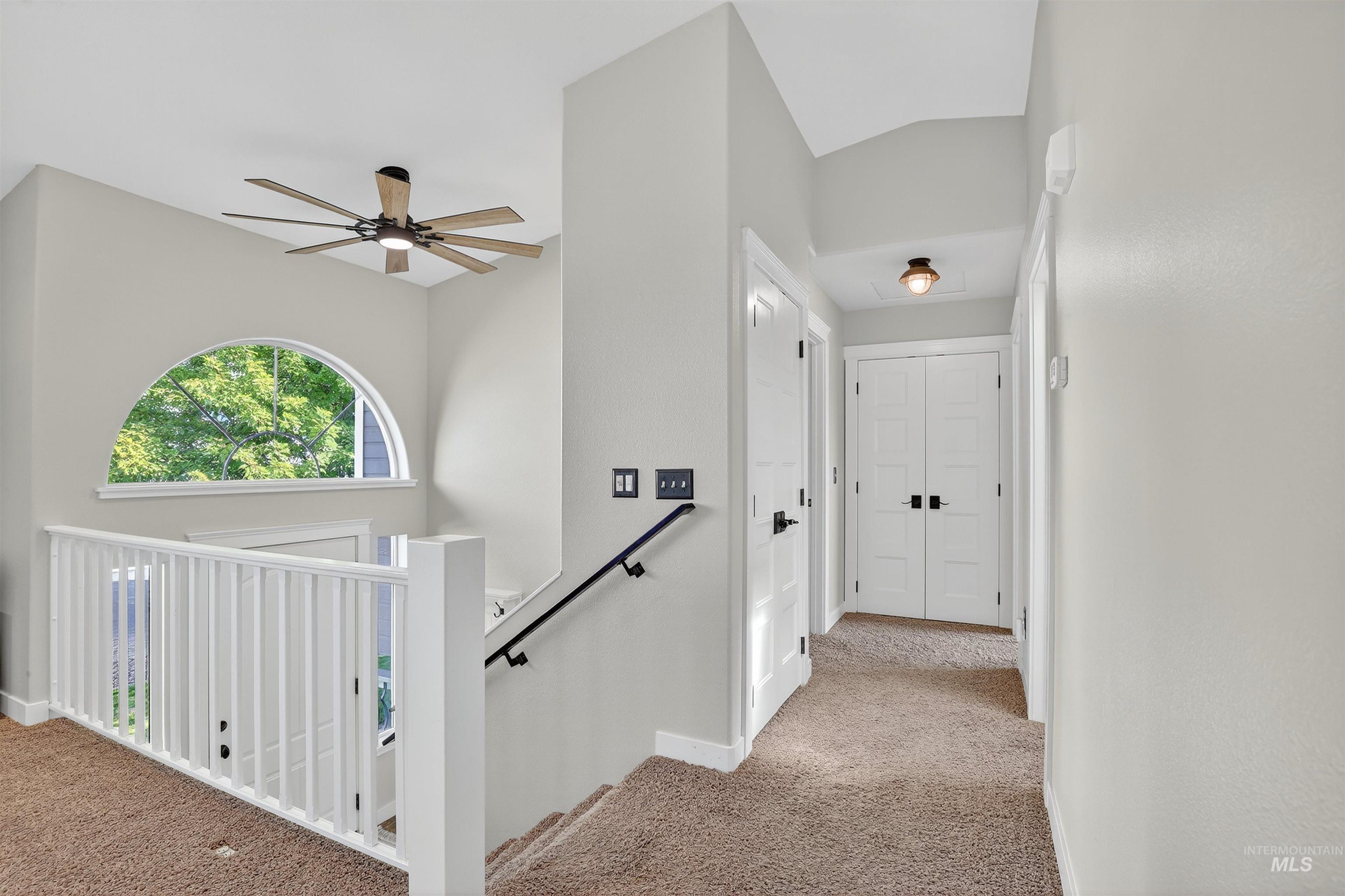 1810 Birch Drive Lewiston, ID 83501 - Photo 14 of 47 Corridor with light carpet and an upstairs landing