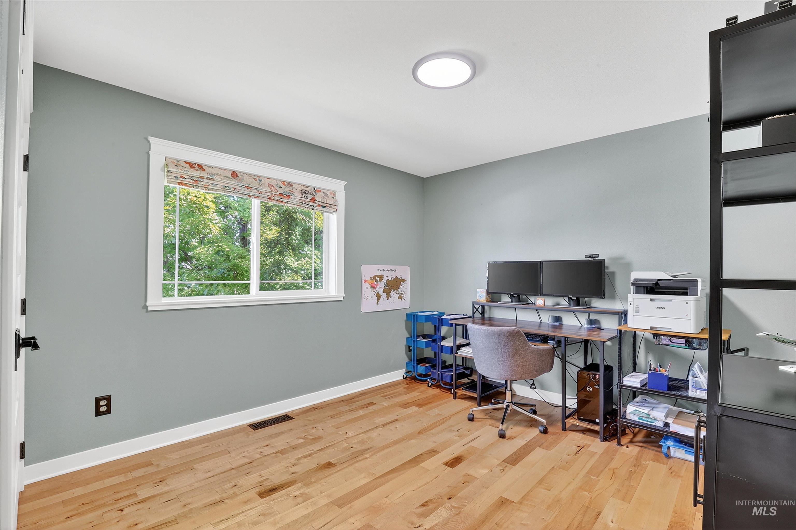 1810 Birch Drive Lewiston, ID 83501 - Photo 18 of 47 Office with light wood-style flooring and baseboards