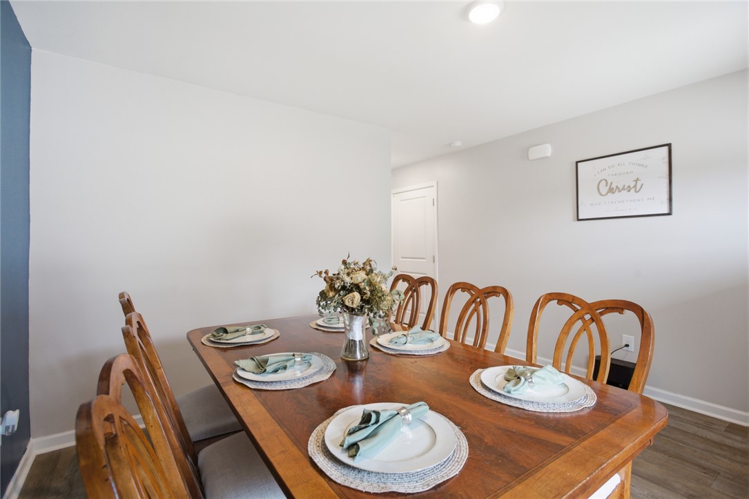 1055 South Depot Street Seneca, SC 29678 - Photo 14 of 43 This inviting dining area features warm tones and ample space for gatherings.