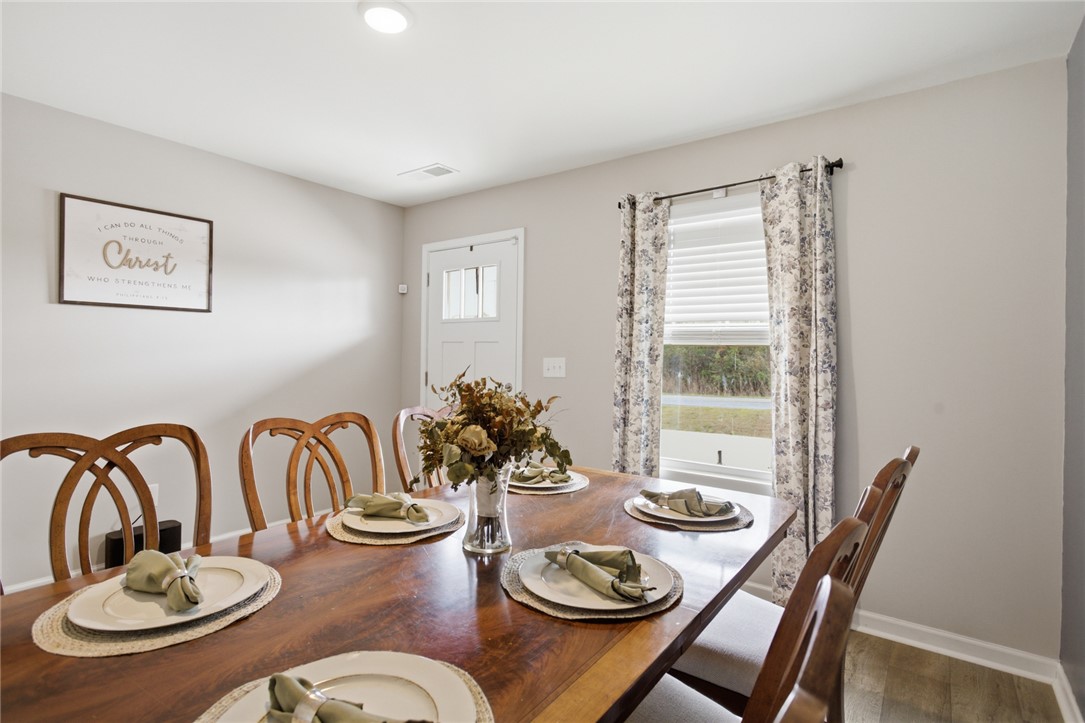 1055 South Depot Street Seneca, SC 29678 - Photo 15 of 43 This inviting dining room offers a comfortable and elegant setting for everyday meals and special gatherings.