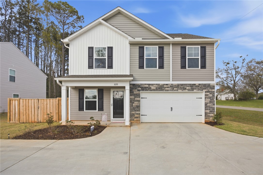 1055 South Depot Street Seneca, SC 29678 - Photo 2 of 43 This newly constructed residence offers a charming exterior with modern design elements and a welcoming entrance.