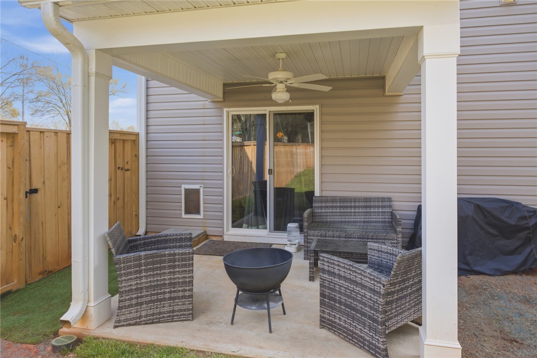 1055 South Depot Street Seneca, SC 29678 - Photo 39 of 43 This private patio area offers a perfect spot for relaxation and outdoor enjoyment.