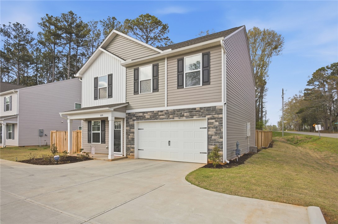 1055 South Depot Street Seneca, SC 29678 - Photo 4 of 43 This charming residence features a well-maintained exterior and inviting front entrance.