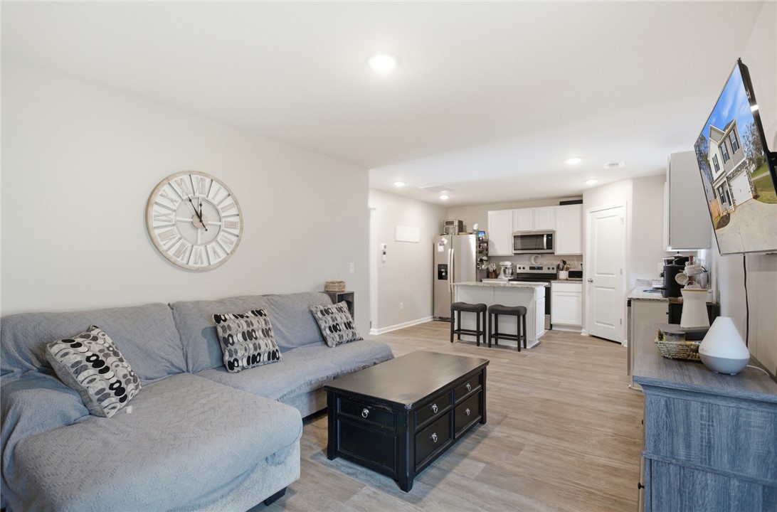 1055 South Depot Street Seneca, SC 29678 - Photo 6 of 43 This open concept living area seamlessly connects to the kitchen, perfect for entertaining.