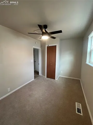 a view of a kitchen with a sink cabinets and a window