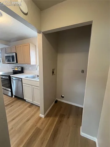 a view of an empty walk in closet